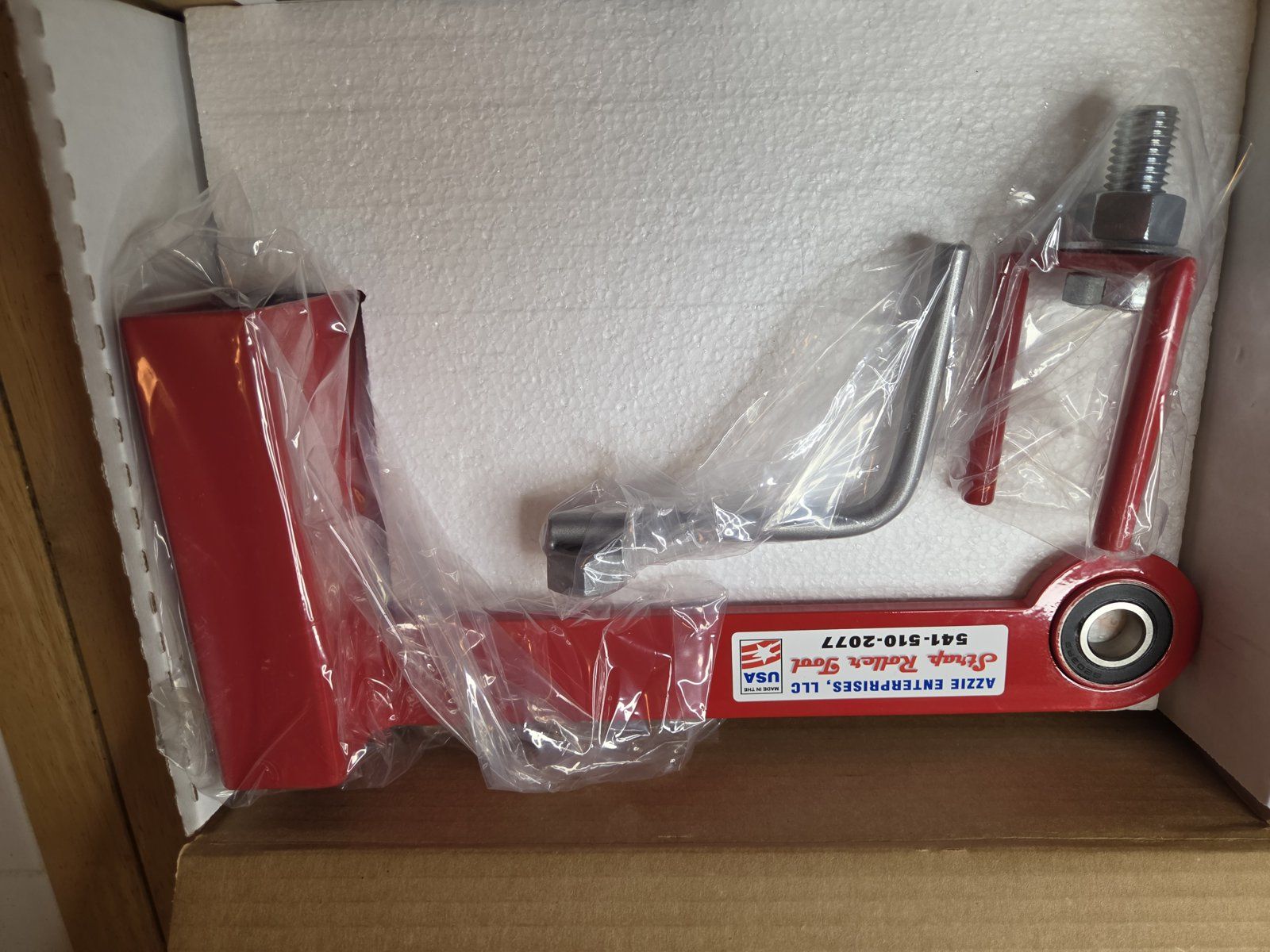 Strap Roller Tool stake pocket mount arm with clamp bracket, bolt and crank handle