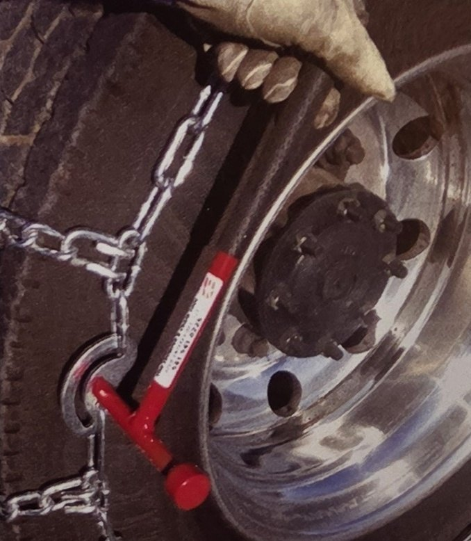 Red Super Combo Tool on a chain cam at a polished aluminum wheel